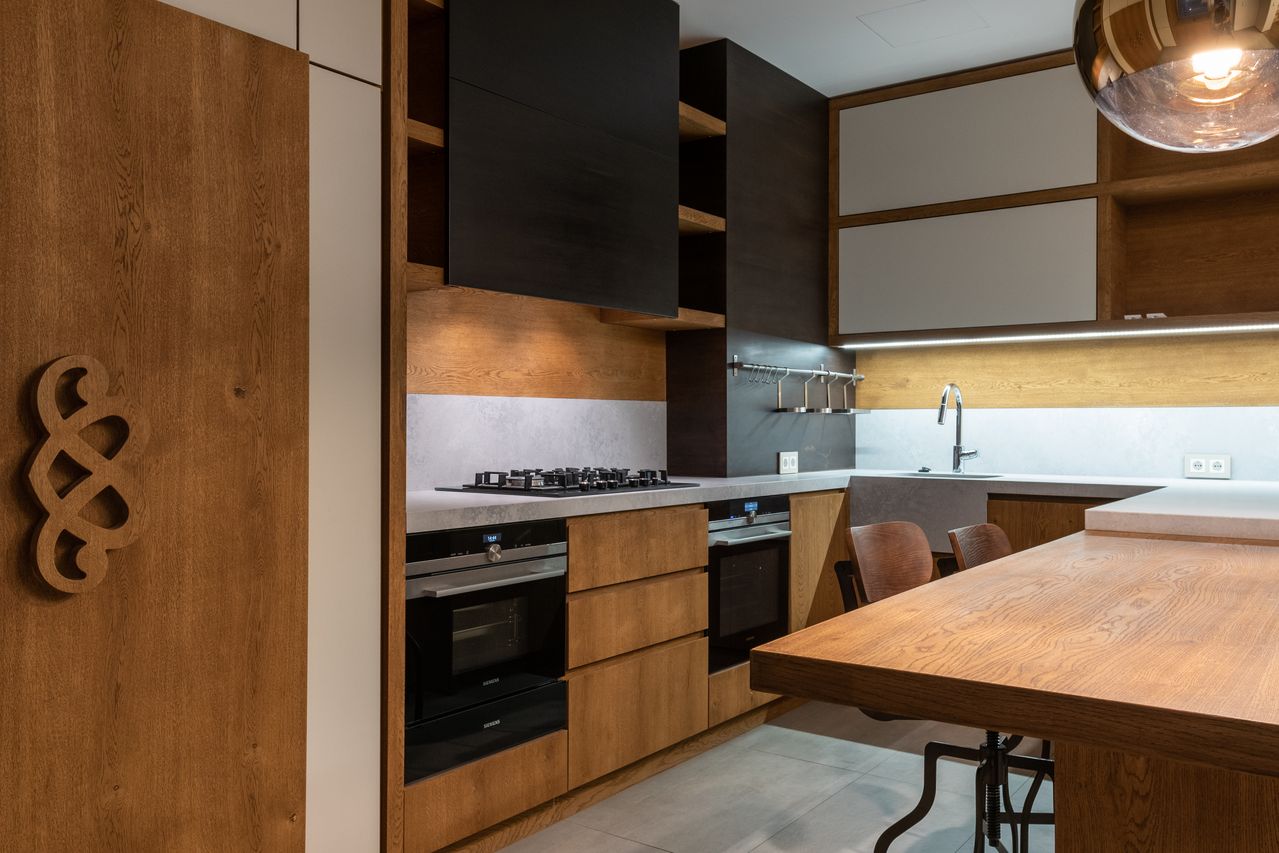 Contemporary kitchen with cabinetry and modern finishes